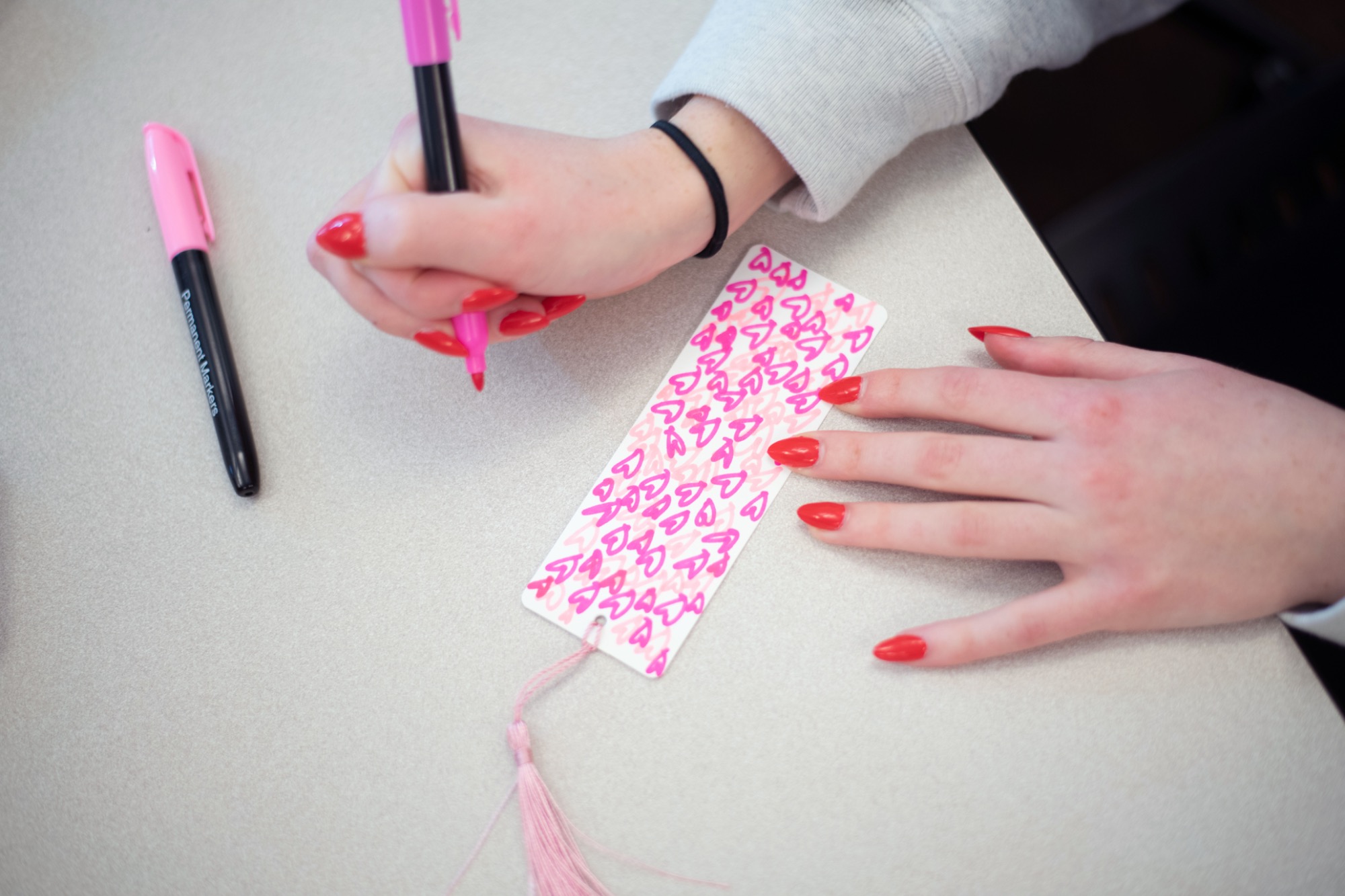 Student creating a bookmark